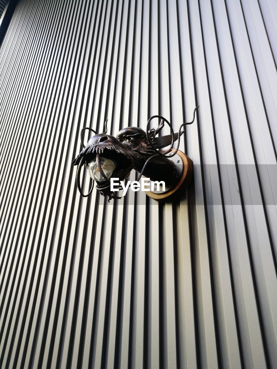 LOW ANGLE VIEW OF METAL STRUCTURE IN CONTAINER