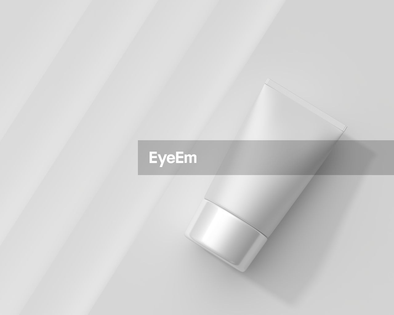 HIGH ANGLE VIEW OF WHITE LAMP ON TABLE