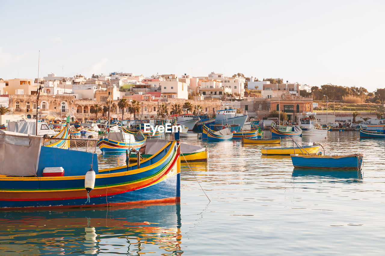 Mediterranean fisherman village in south east of malta. early winter morning in marsaxlokk, malta.