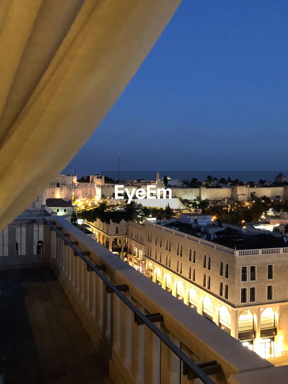 ILLUMINATED BUILDINGS AT NIGHT