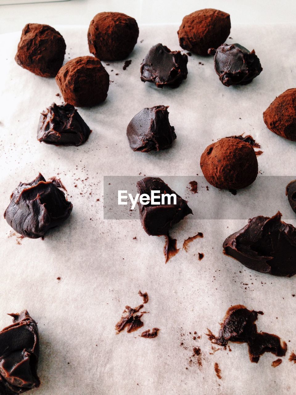 Close-up of chocolates on tissue paper