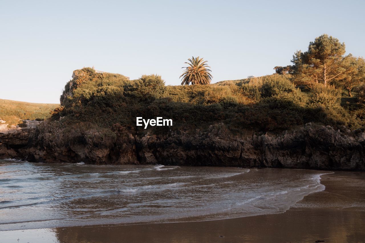 Scenic view of sea against clear sky