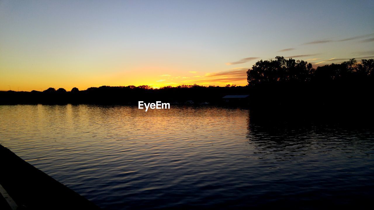 SUNSET OVER LAKE