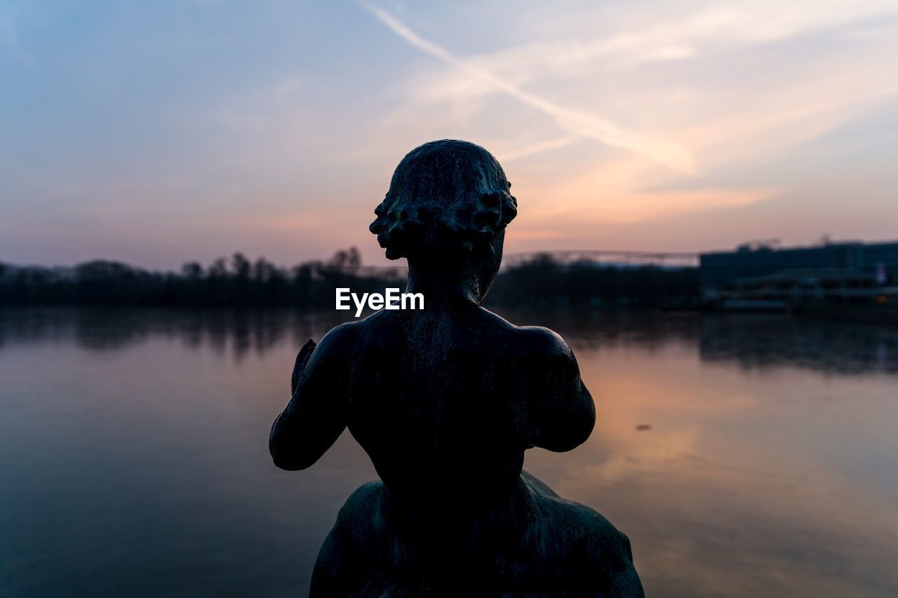 Statue against sky during sunset