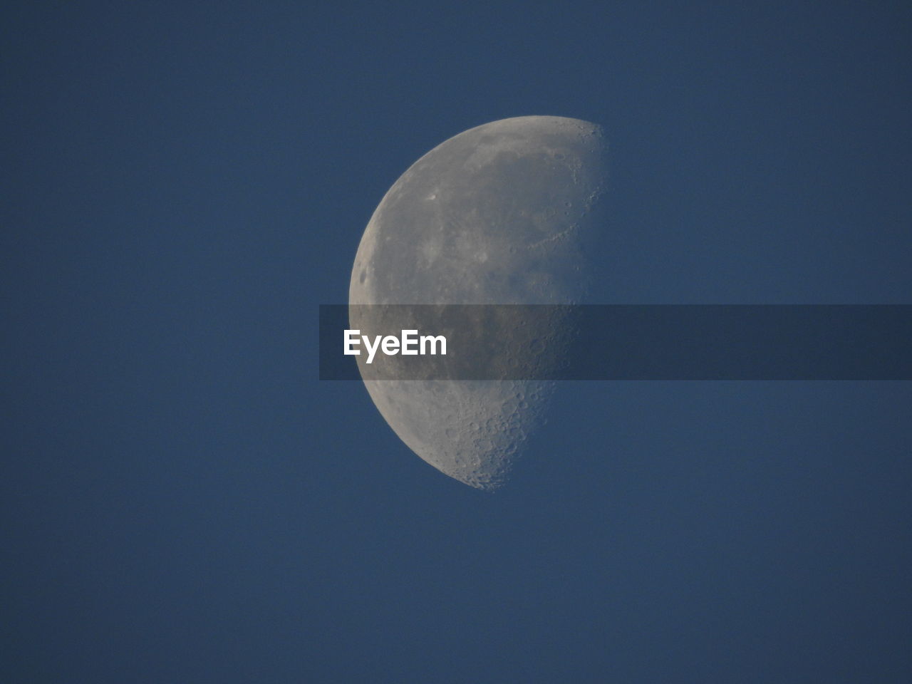 Close-up of moon at clear sky