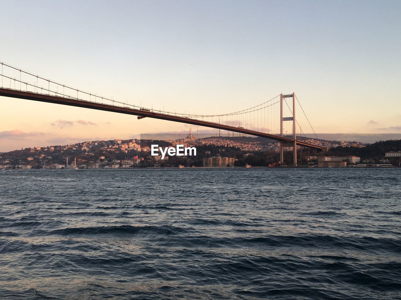 View of suspension bridge over river