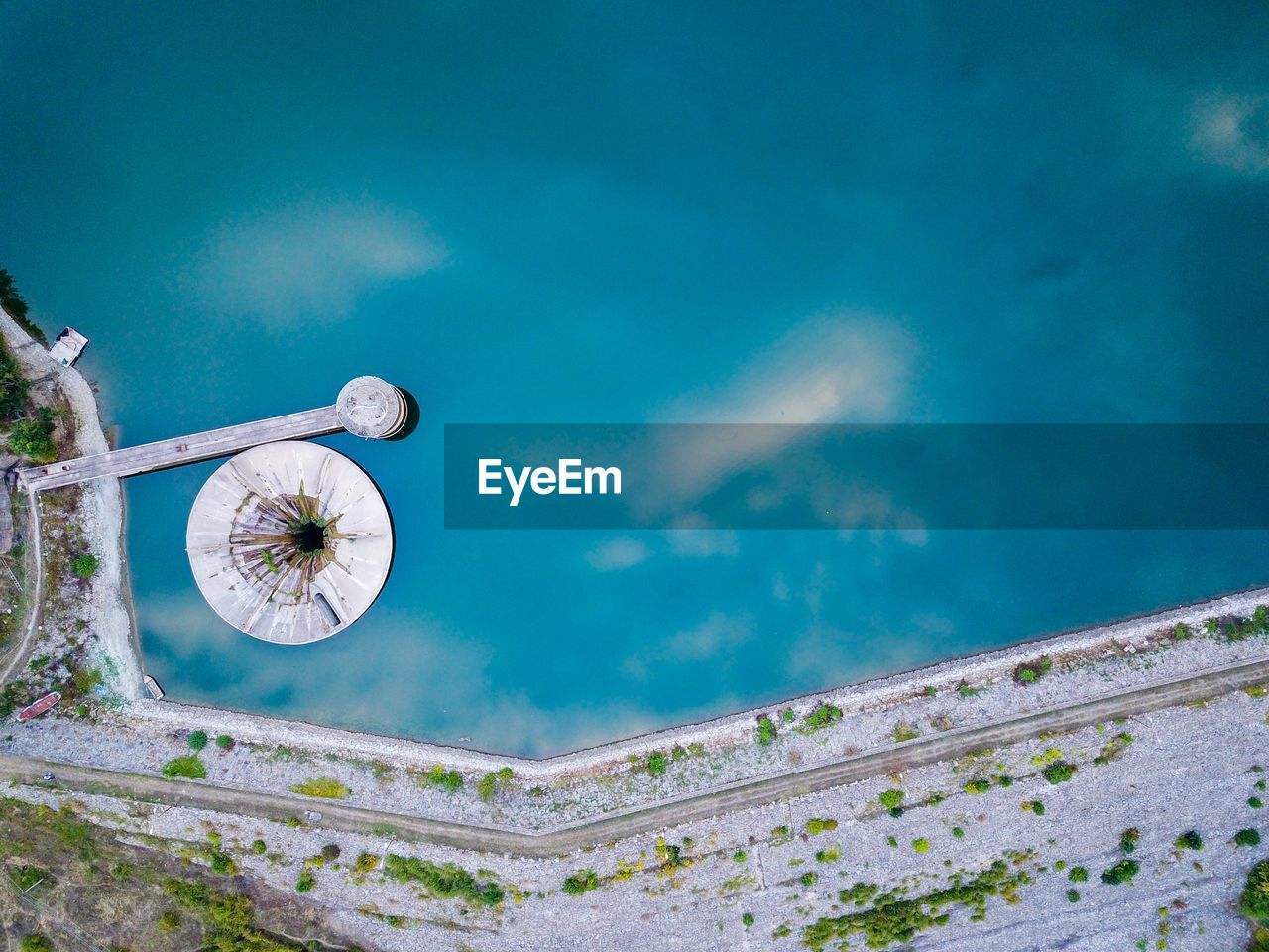 High angle view of swimming pool by sea against sky