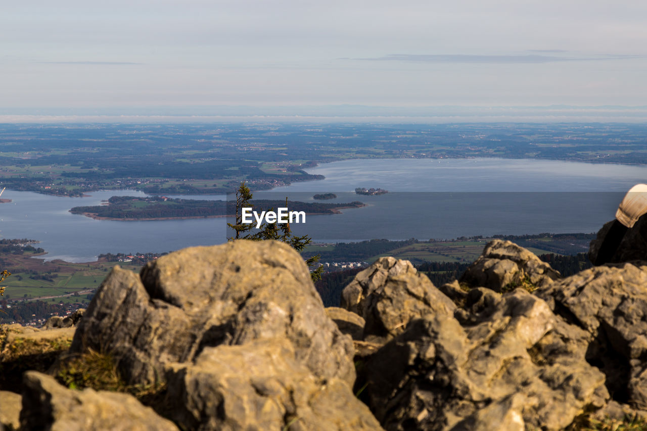 SCENIC VIEW OF SEA AND ROCKS AGAINST SKY