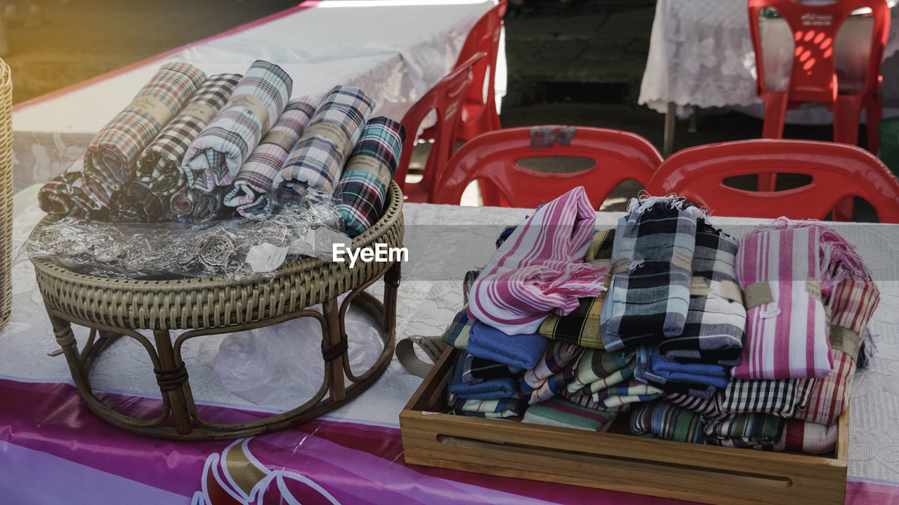 CLOSE-UP OF CLOTHES FOR SALE