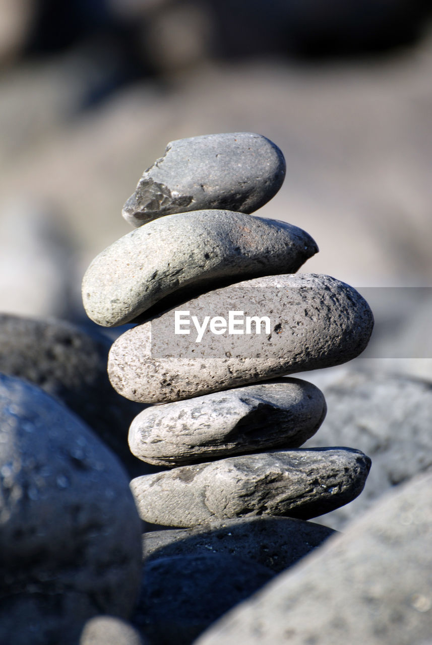 Close-up of stone stack on rock