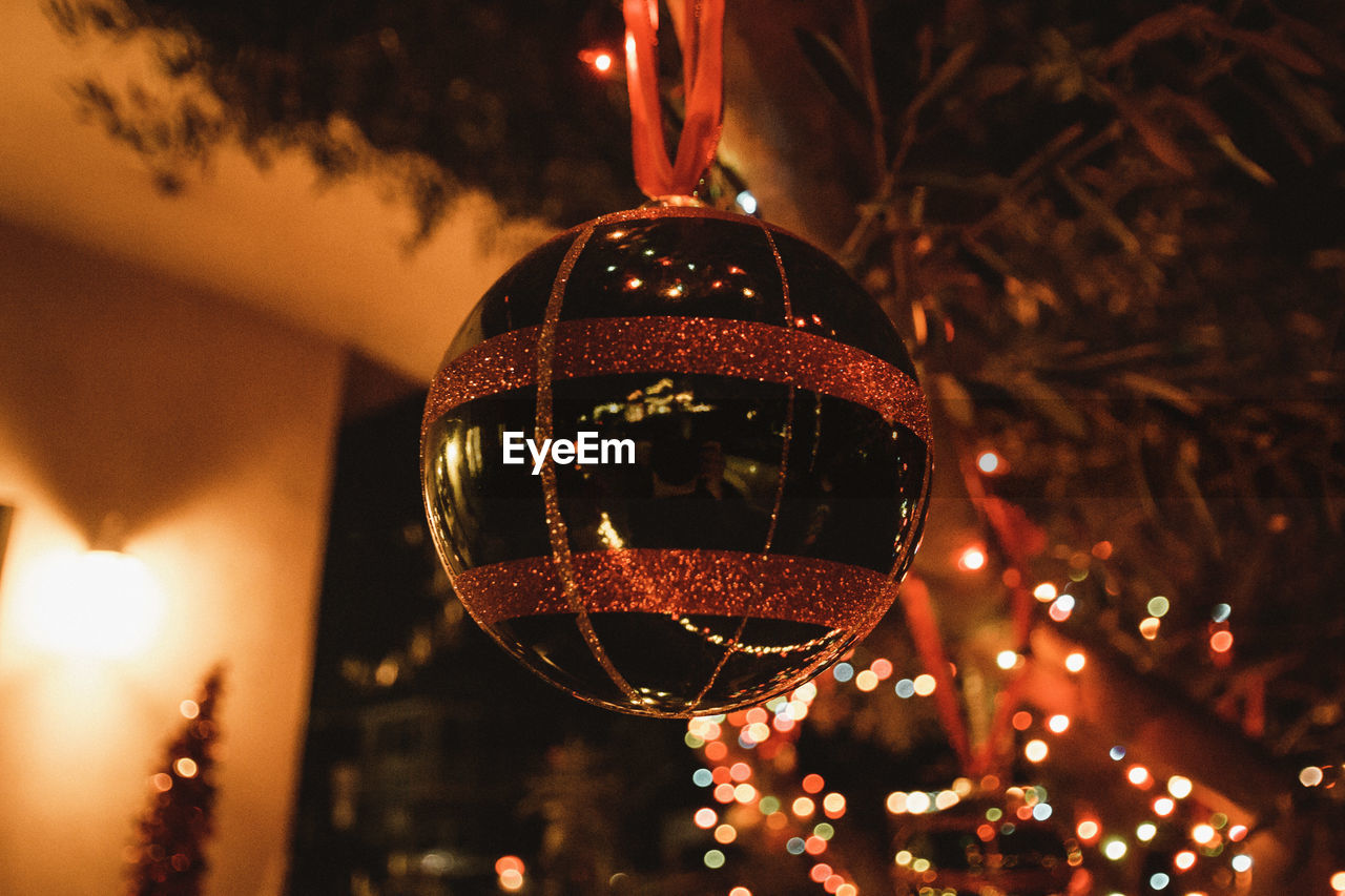 CLOSE-UP OF ILLUMINATED CHRISTMAS TREE