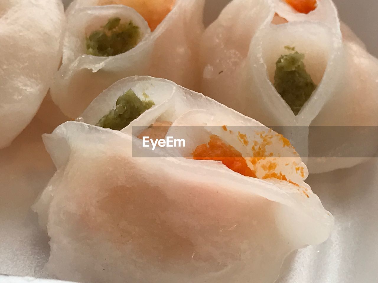 CLOSE-UP OF ICE CREAM IN CONTAINER