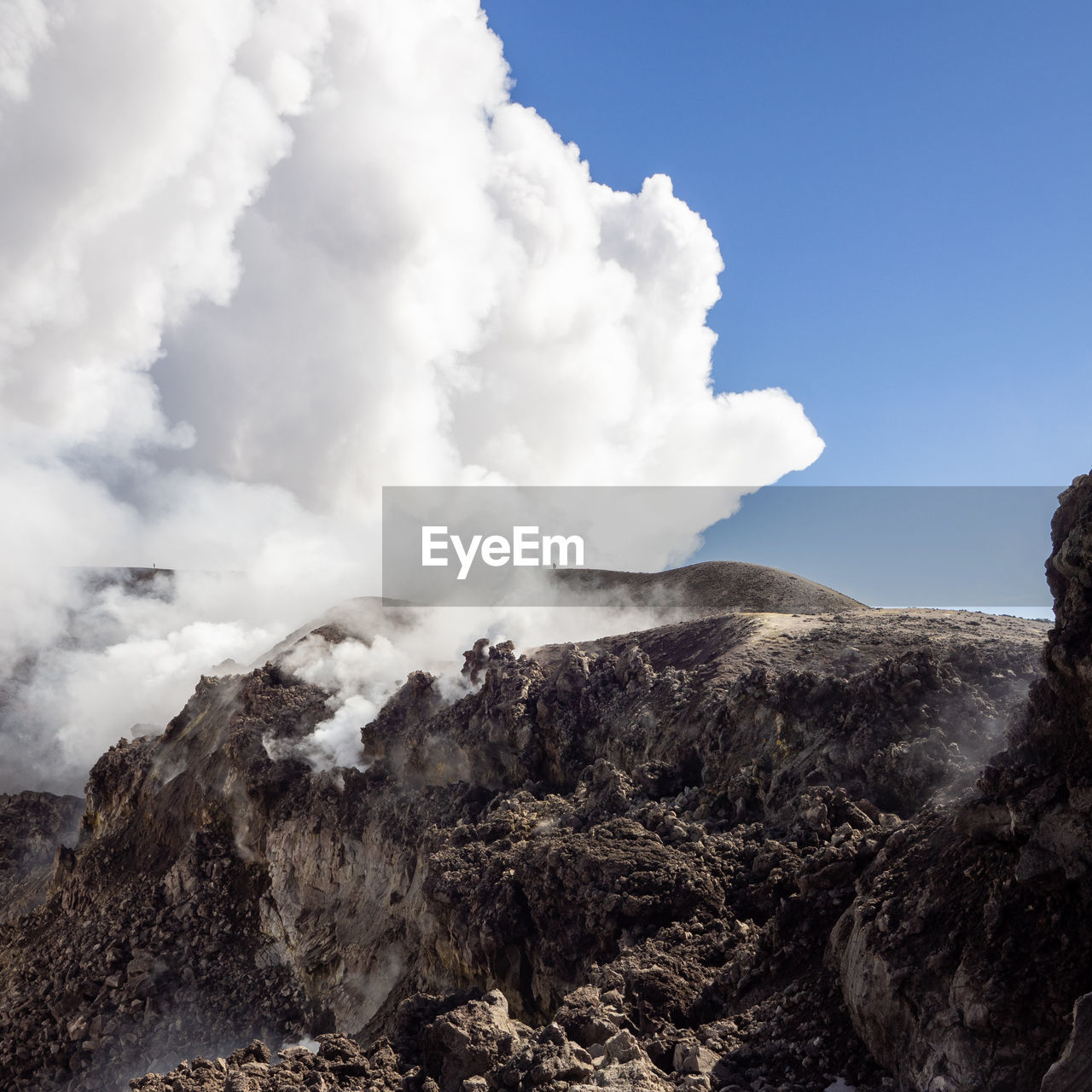 Scenic view of volcanic landscape against sky