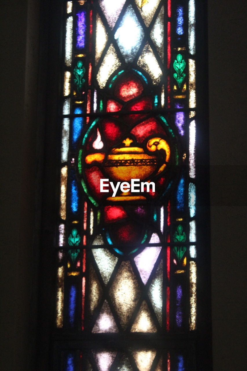 Low angle view of stained glass in church