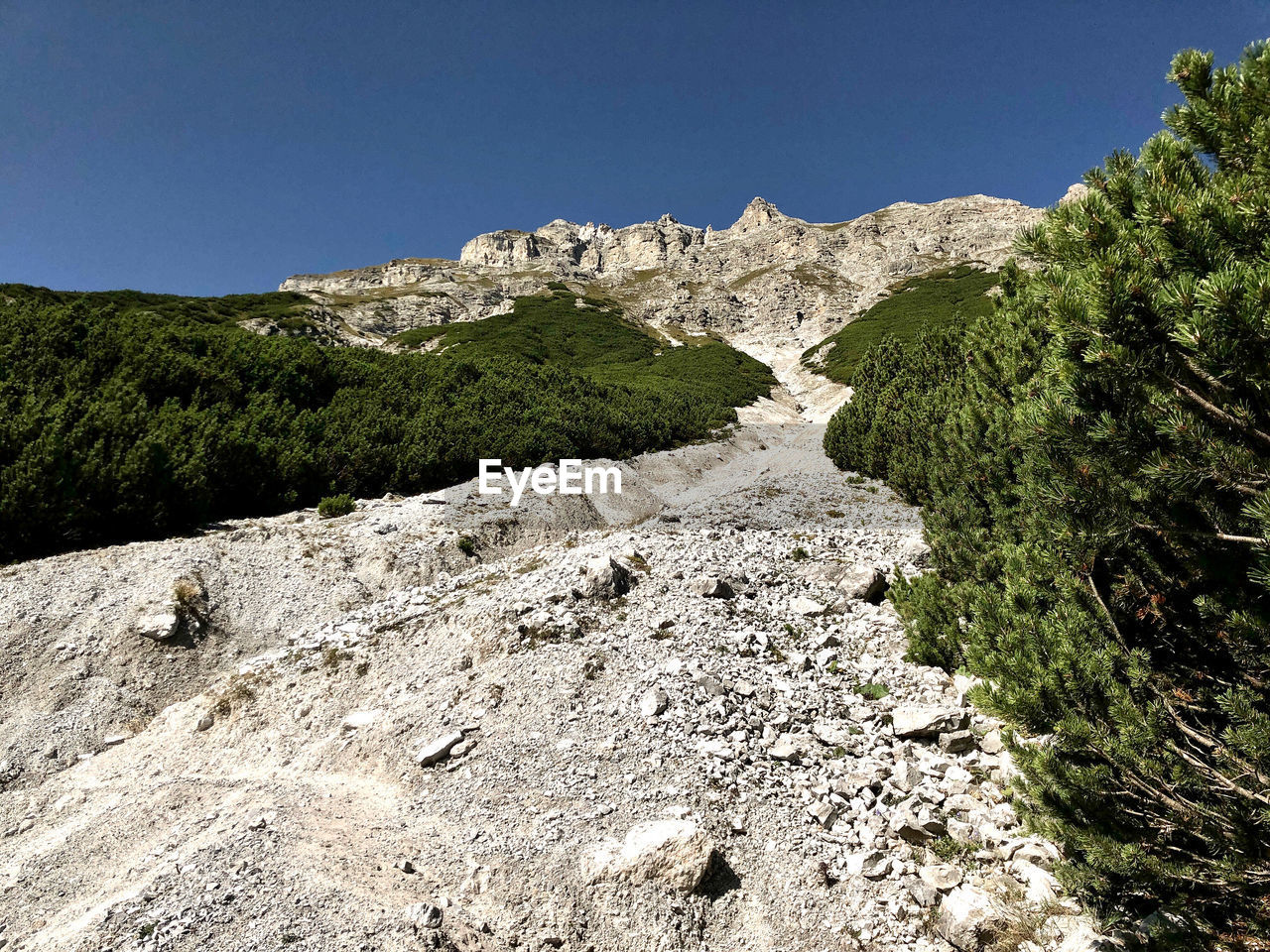 Scenic view of rocky mountains against clear sky