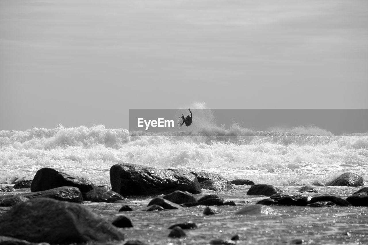 View of a man surfing in the sea