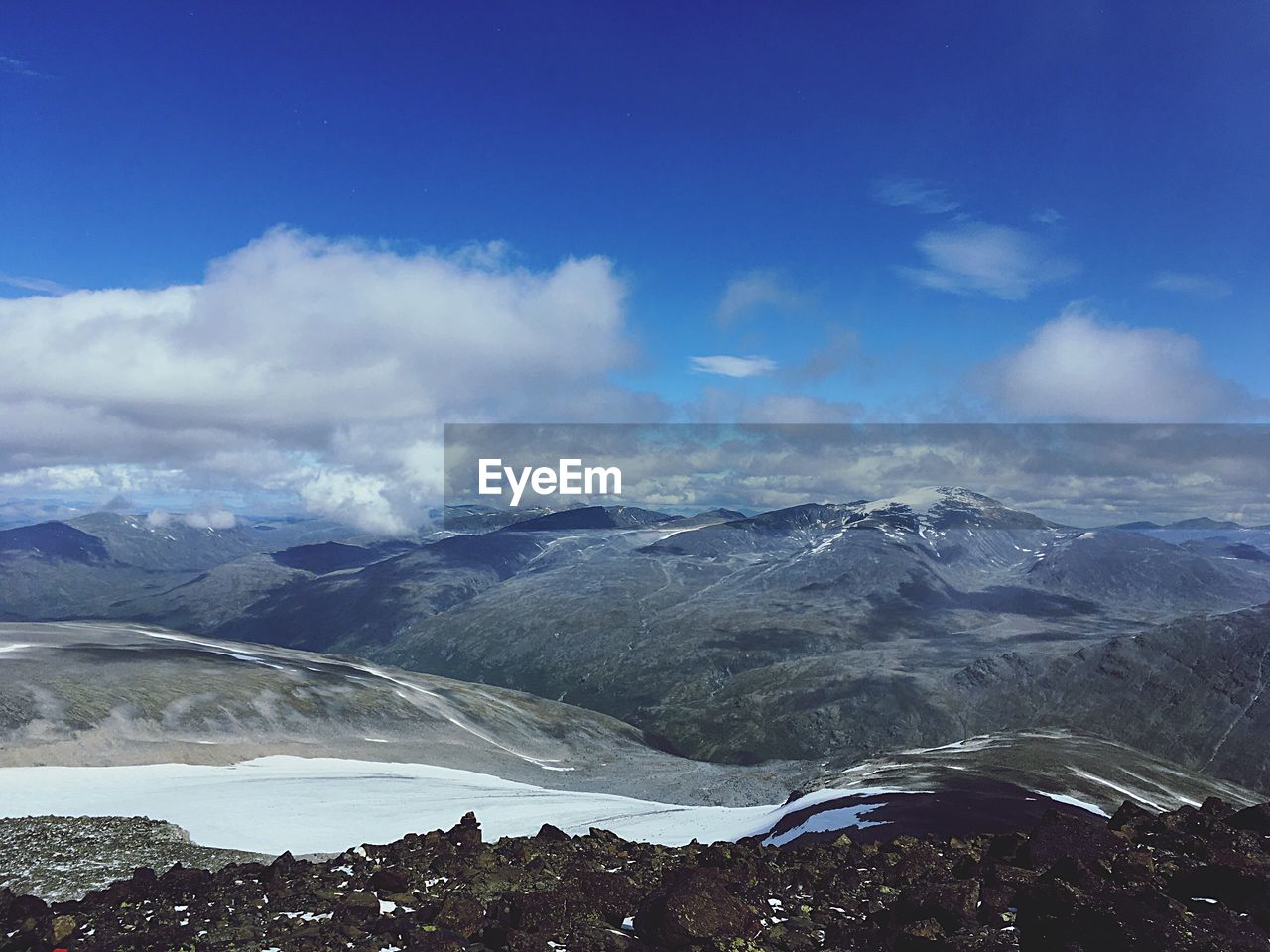 Scenic view of mountains against sky during winter