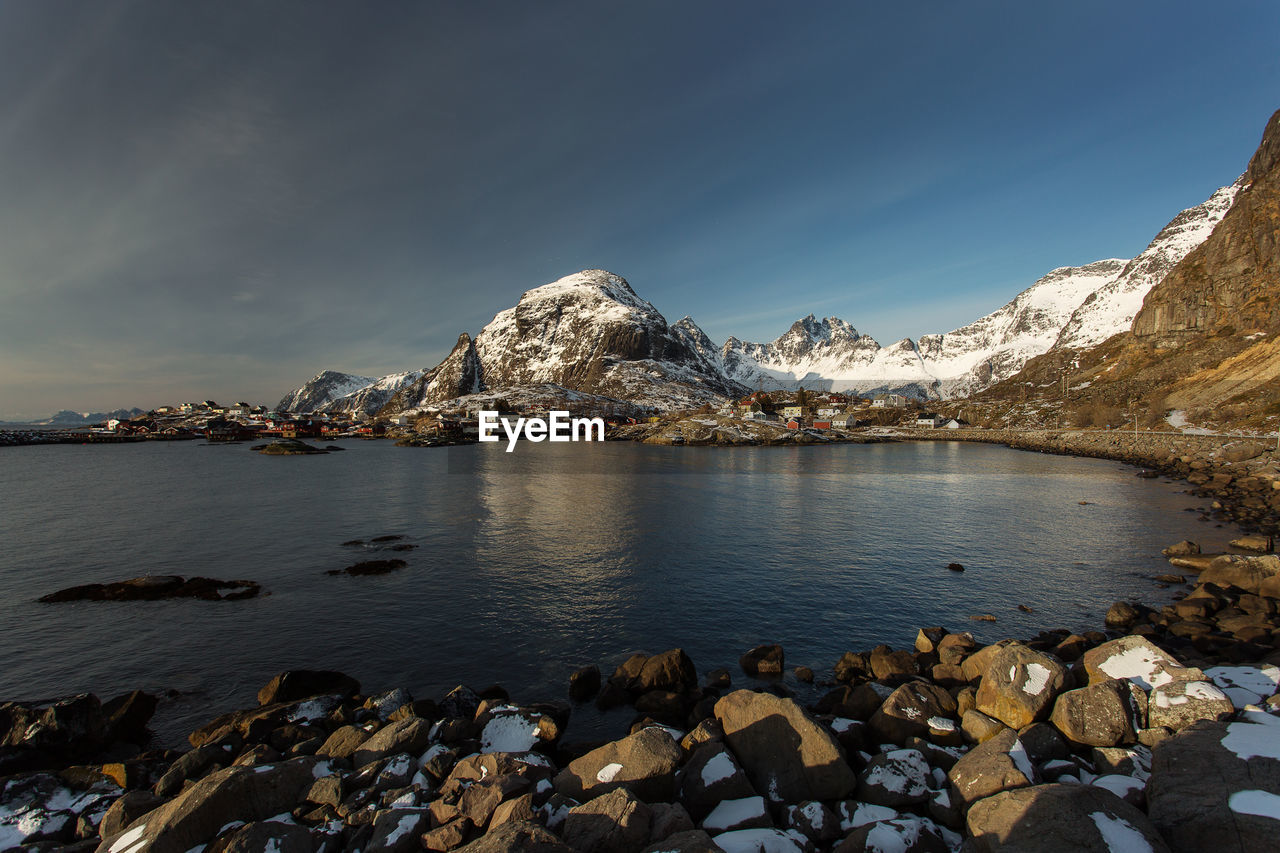 Scenic view of sea and rocks against sky