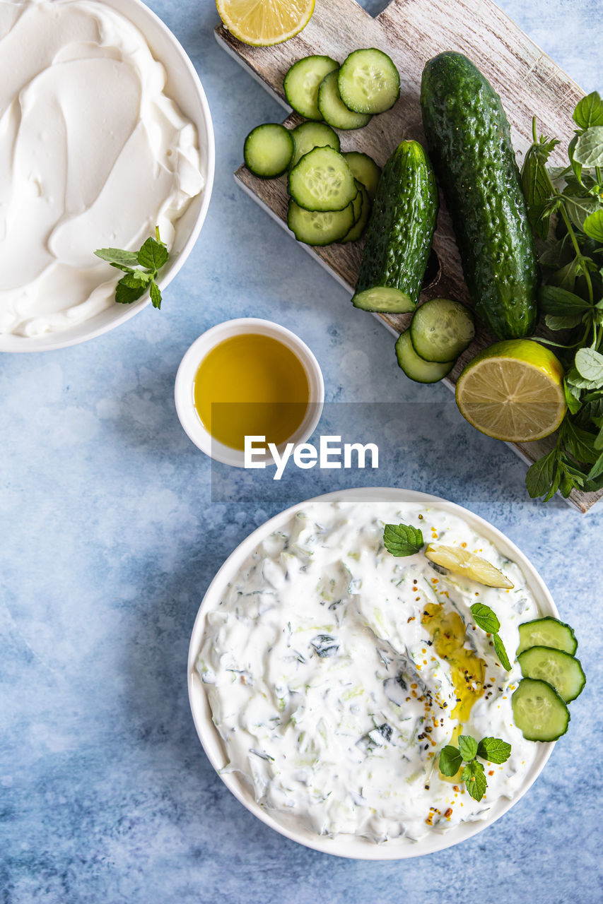 Indian or pakistani raita sauce or dip with cucumber, yoghurt, garlic and mint. 