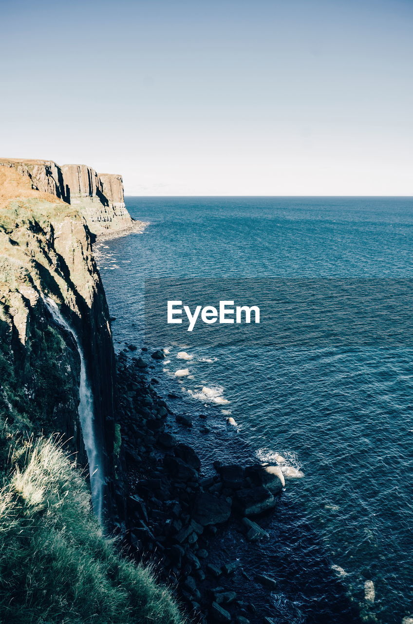 Scenic view of sea against clear sky