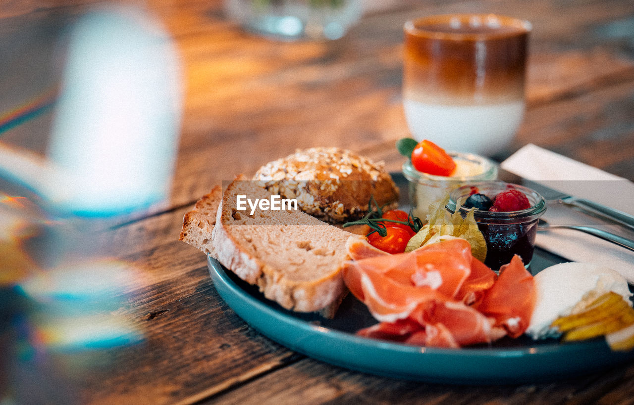 Close-up of breakfast served on table