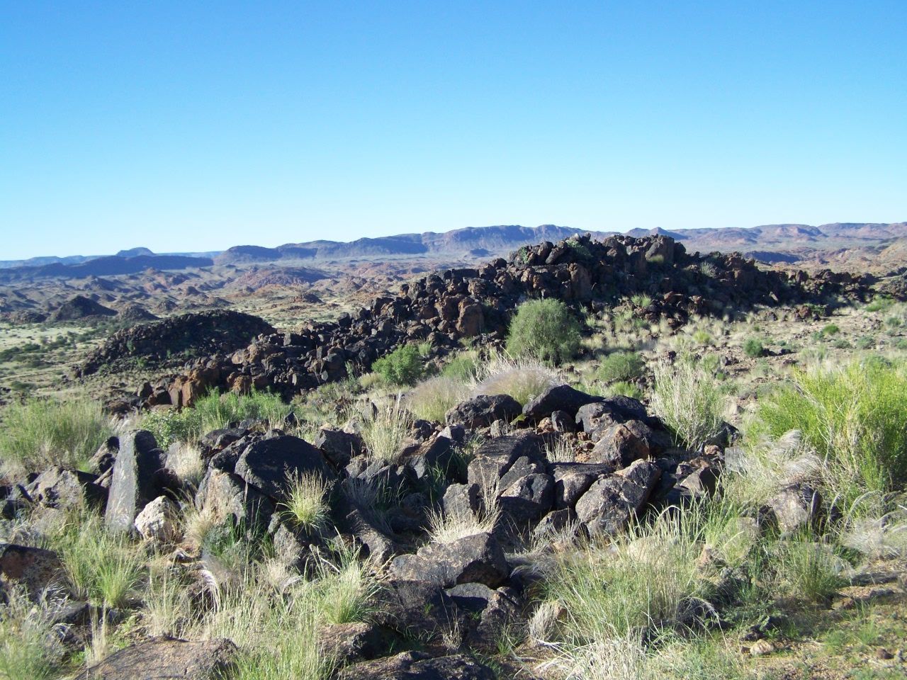 Scenic view of landscape against clear blue sky