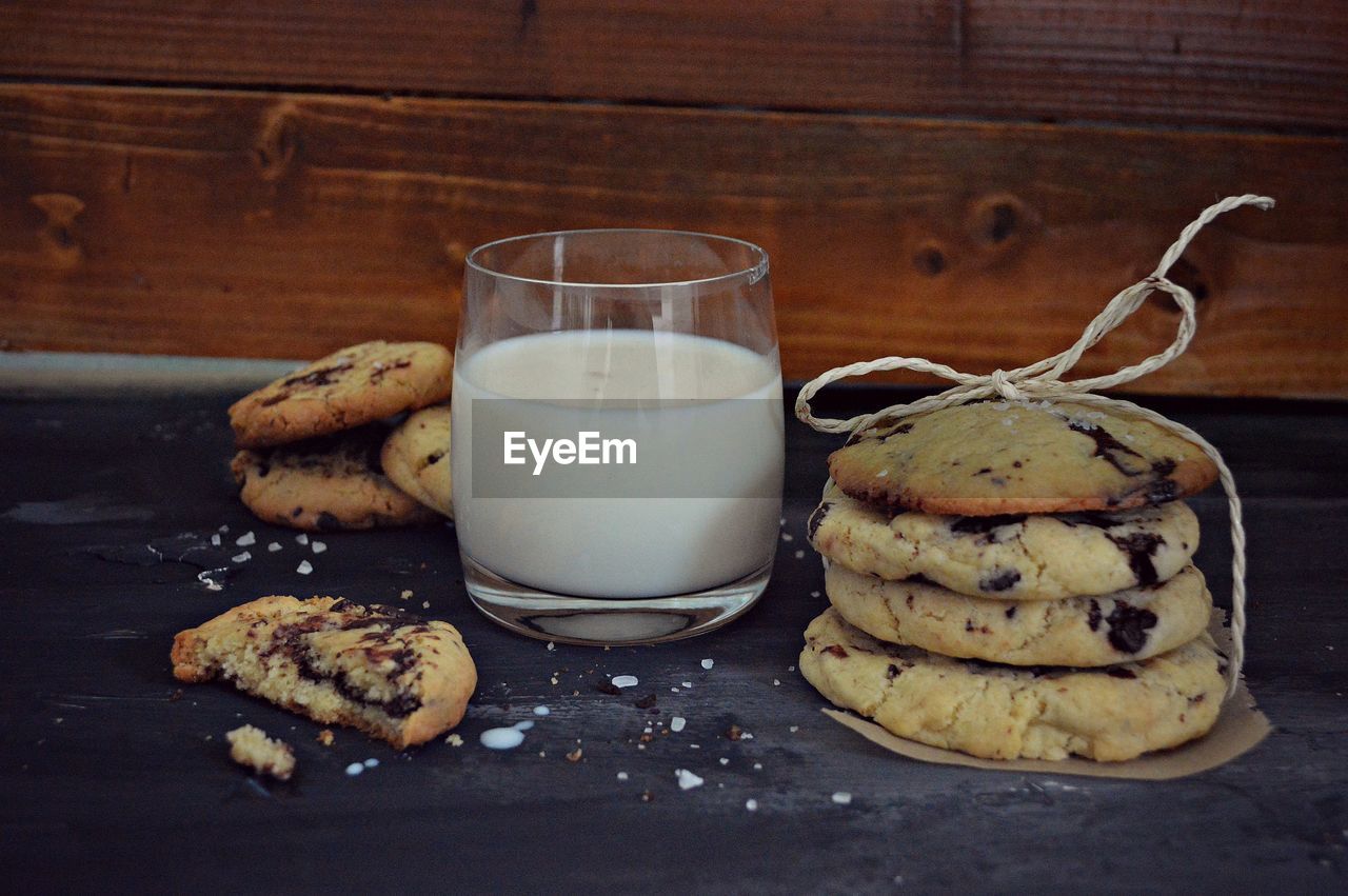 Close-up of milk and cookies on table