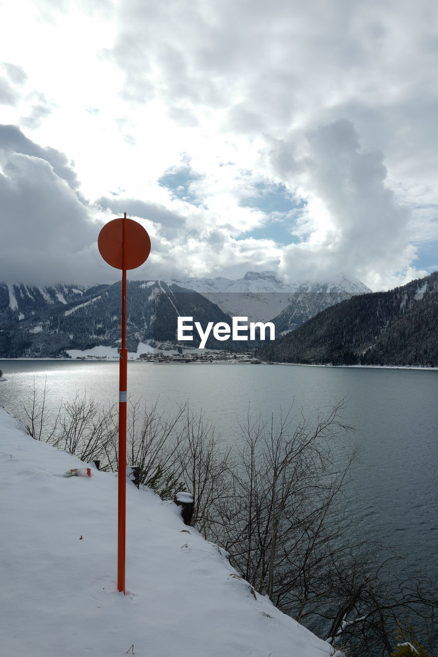 Scenic view of frozen lake against sky