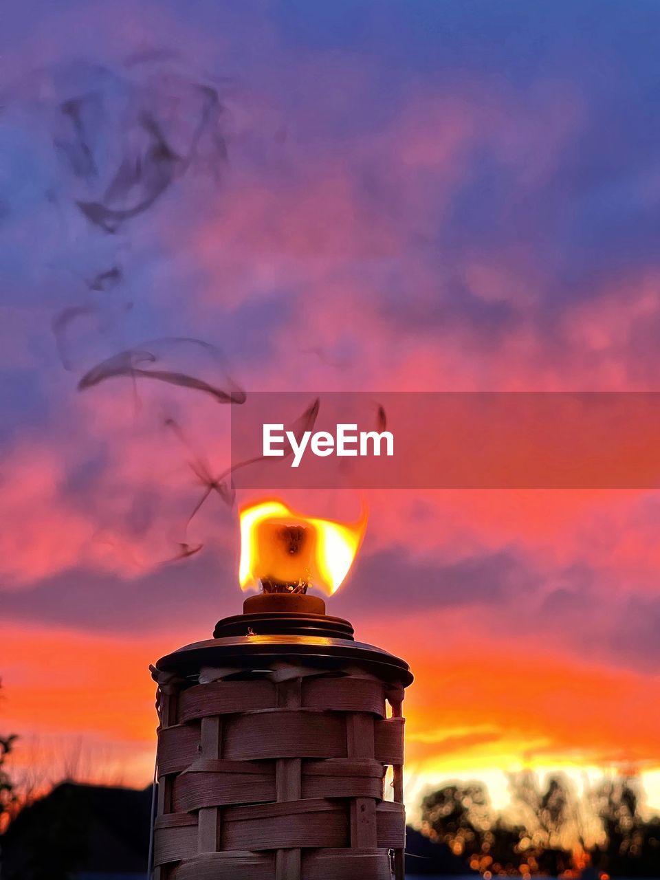 VIEW OF A BIRD FLYING AGAINST SKY DURING SUNSET