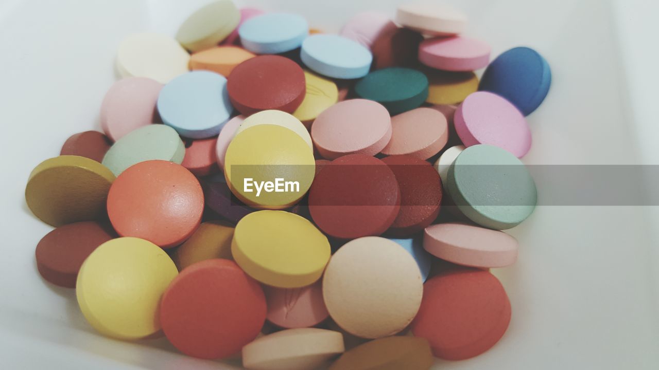 Close-up of colorful round pills