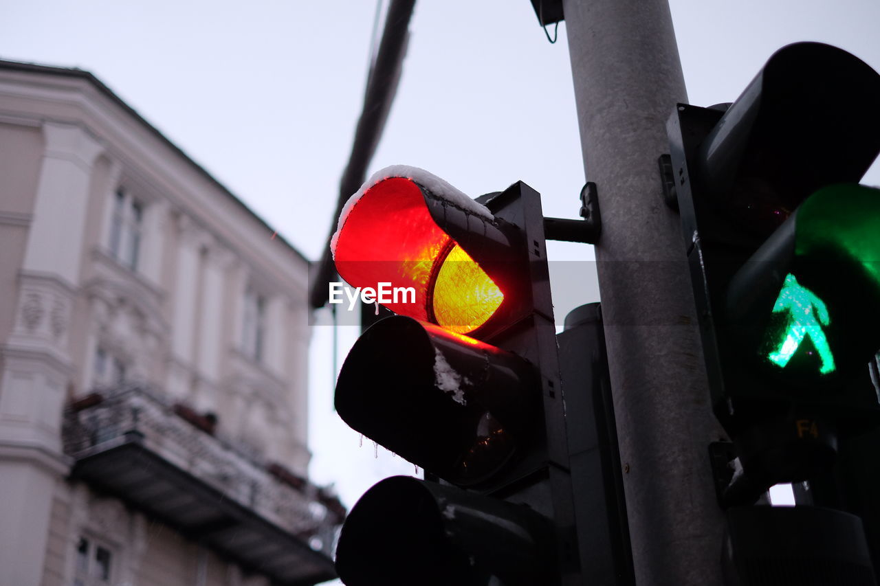 Low angle view of illuminated road signal