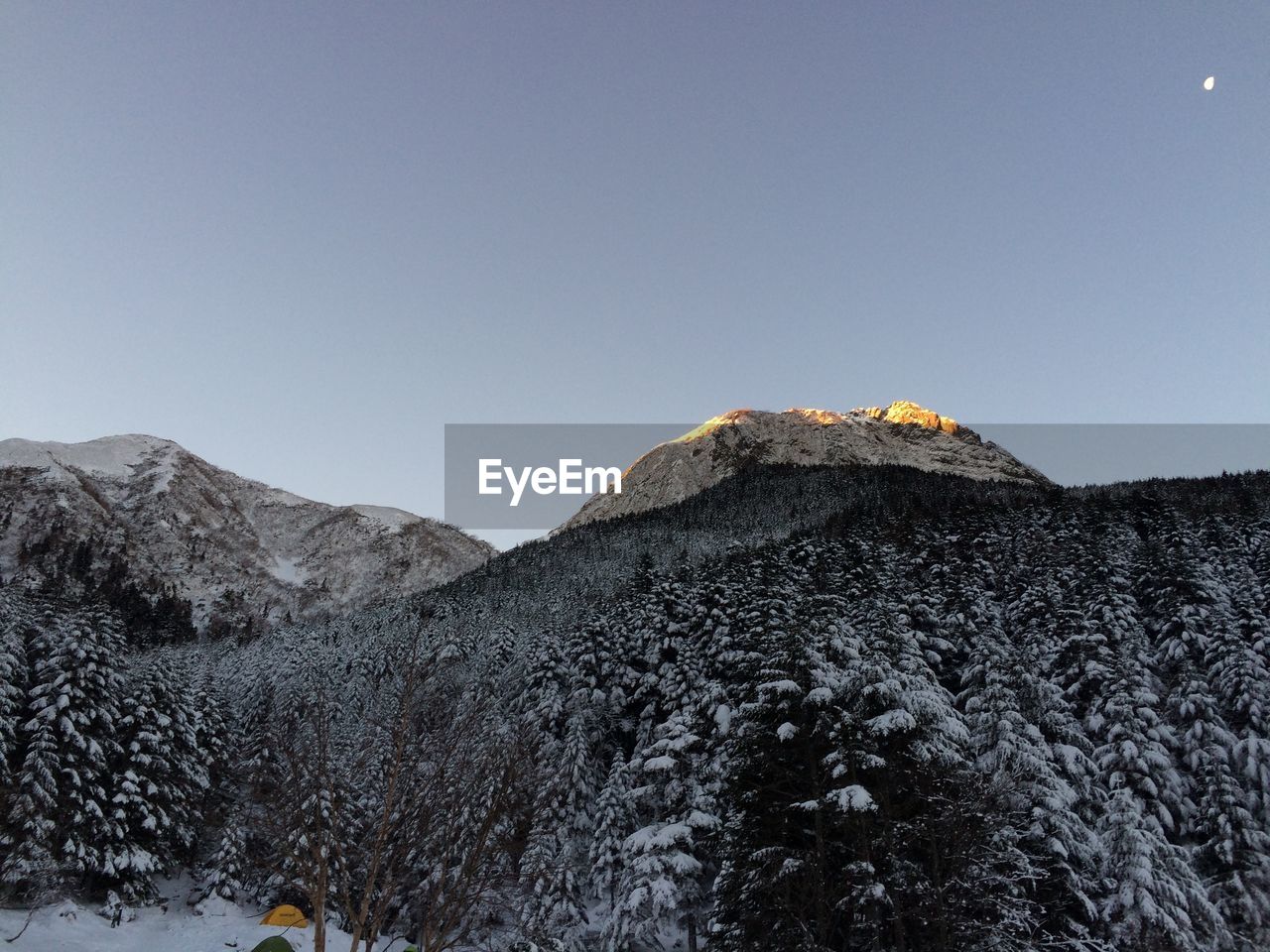 Scenic view of mountains against clear sky