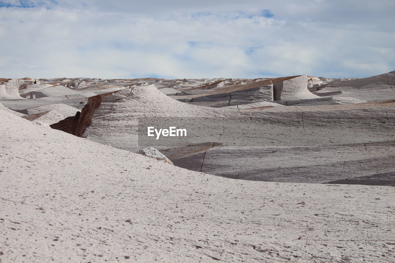 panoramic view of desert against sky