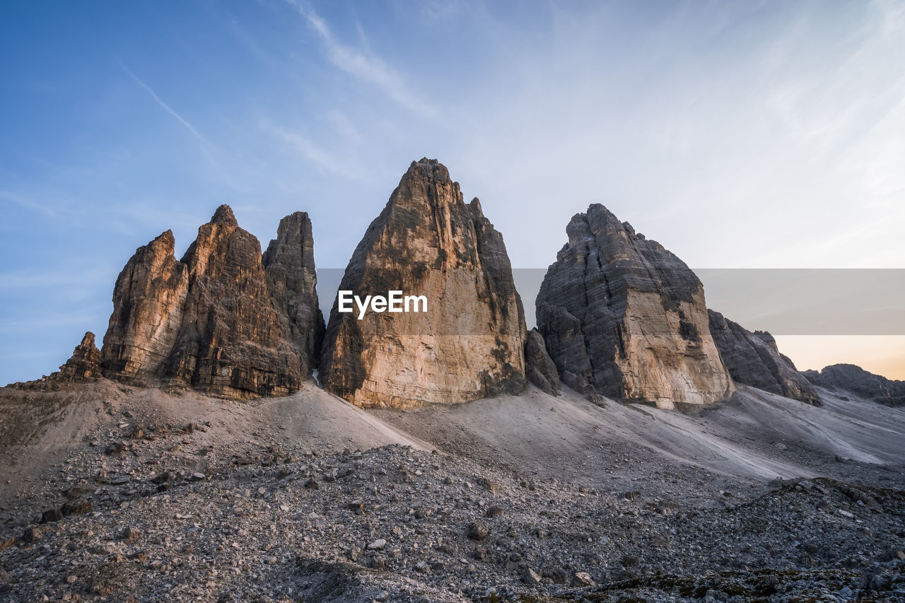 PANORAMIC VIEW OF ROCKS ON MOUNTAIN AGAINST SKY