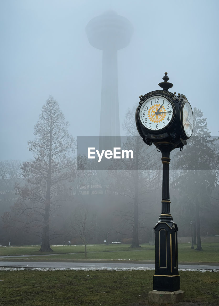 A quarter past one, niagara falls rotary clocks with skylon tower on background