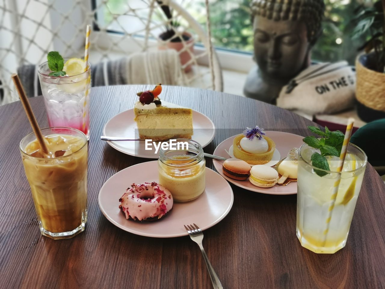 Close-up of desserts served on table