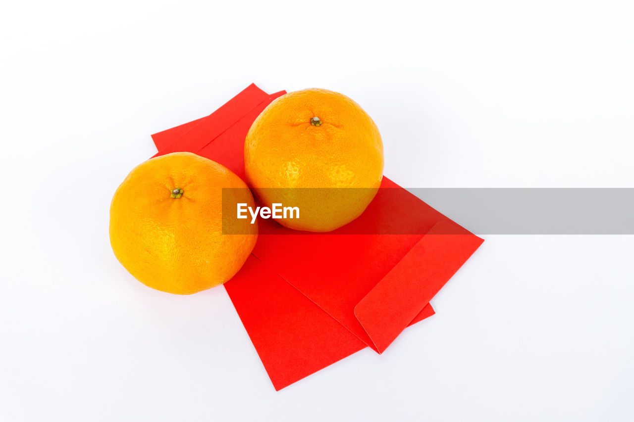 food and drink, orange, food, fruit, healthy eating, orange color, produce, plant, freshness, studio shot, citrus fruit, yellow, wellbeing, cut out, no people, clementine, white background, red, indoors, tangerine, paper, grapefruit, copy space, blood orange, still life