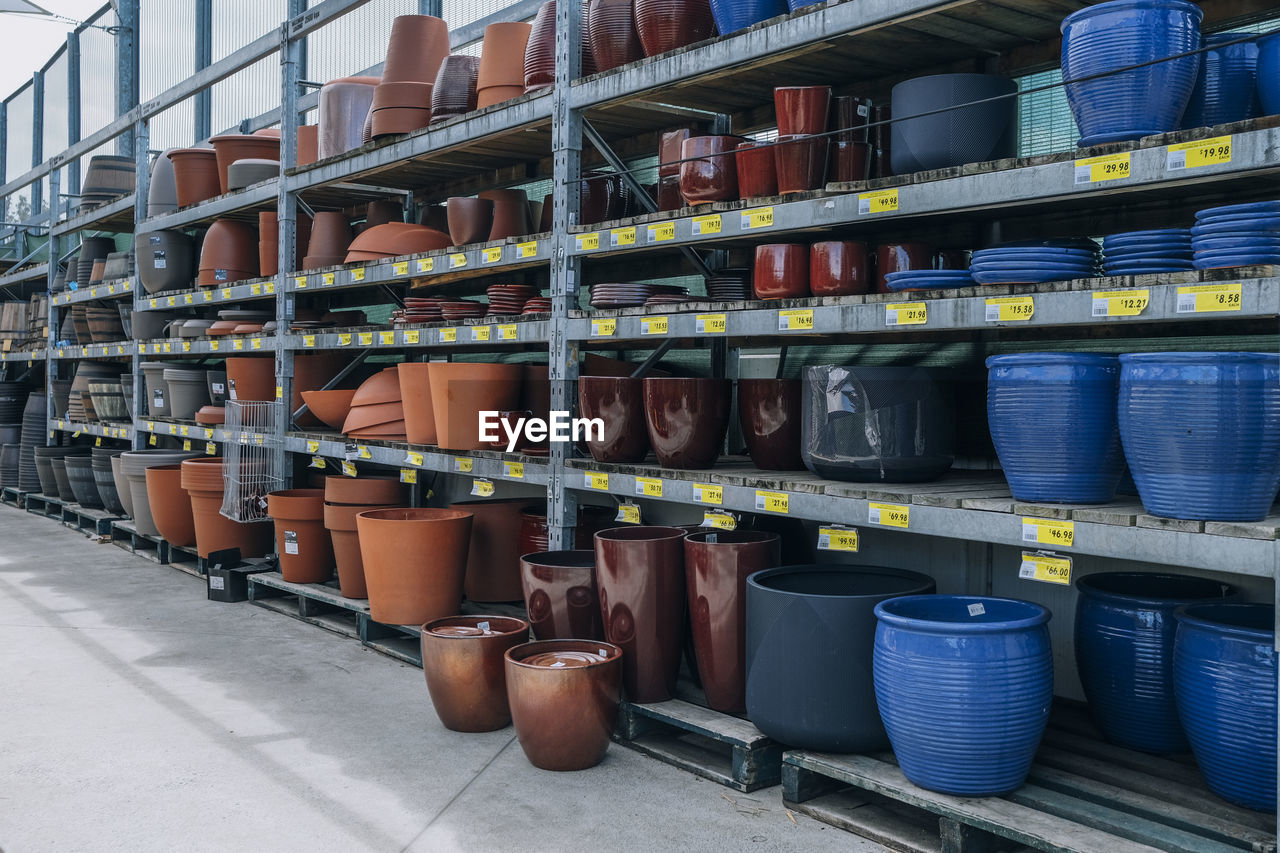 container, shelf, large group of objects, in a row, transport, business, industry, architecture, order, domestic room, no people, storage compartment, warehouse, abundance, business finance and industry, arrangement, indoors, factory, transportation, equipment