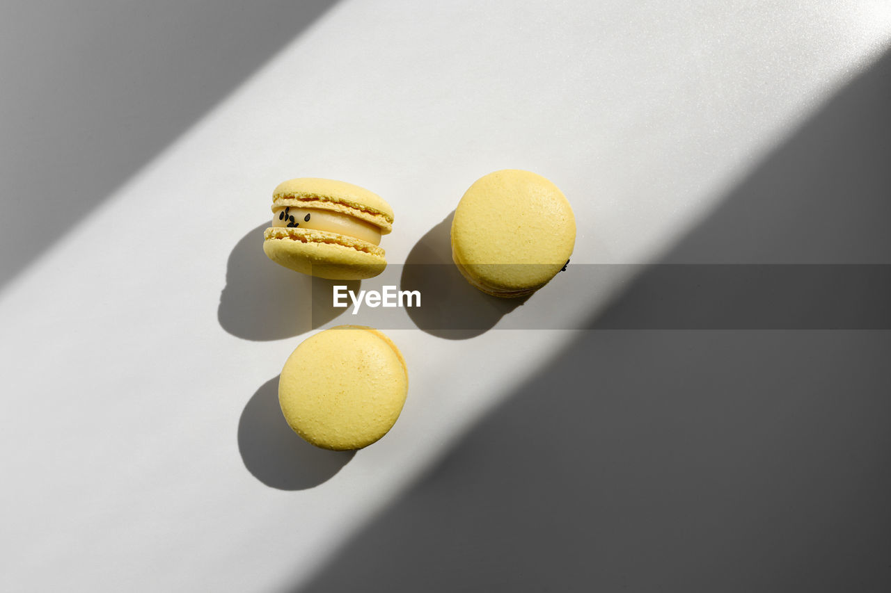 HIGH ANGLE VIEW OF FRUITS ON WHITE TABLE