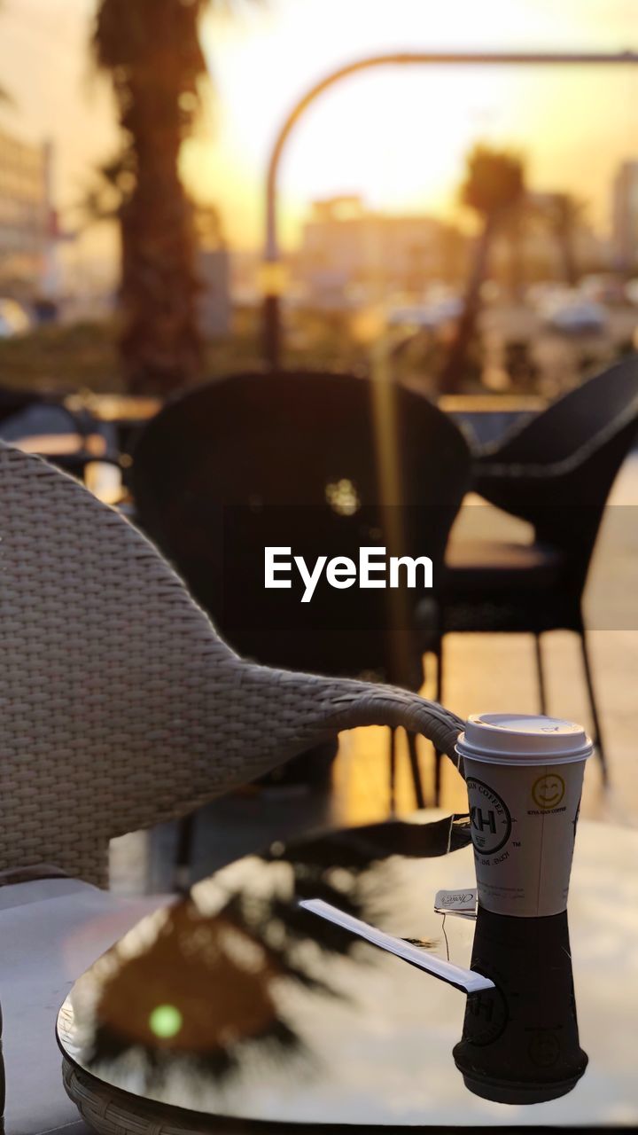 CLOSE-UP OF FOOD ON TABLE AT SUNSET