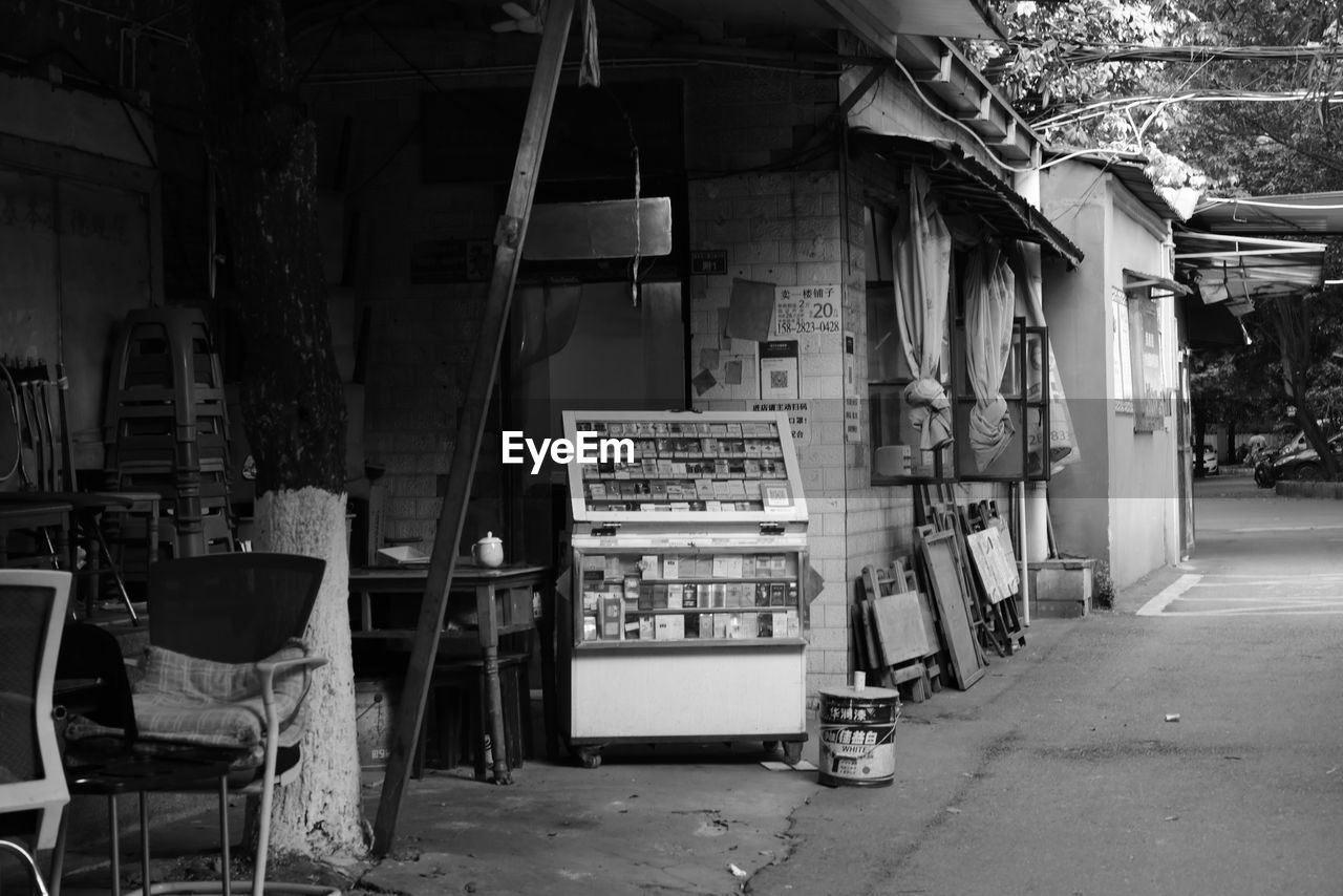 Empty chairs on street