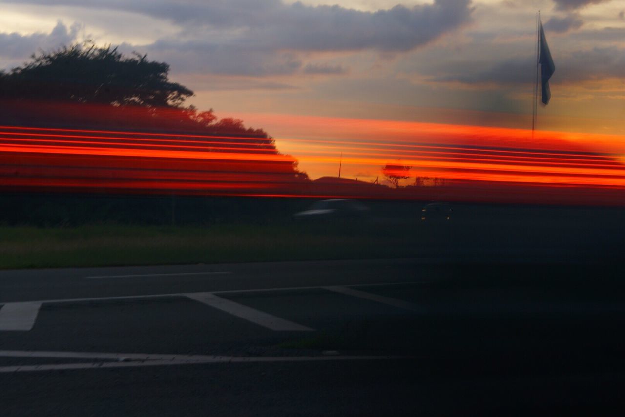 Road against sky at sunset