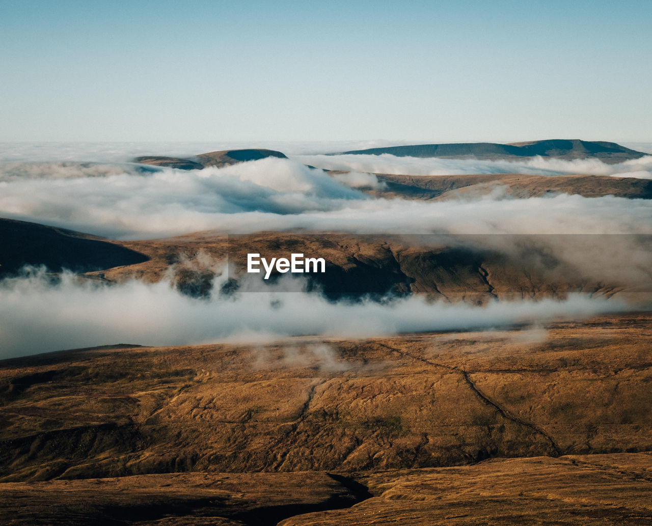 Scenic view of volcanic landscape against sky