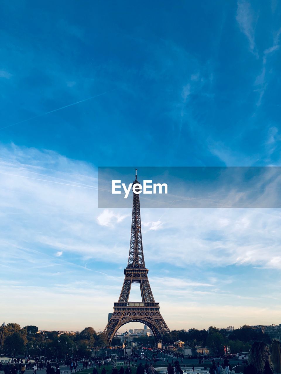 Low angle view of eiffel tower against blue sky during sunset