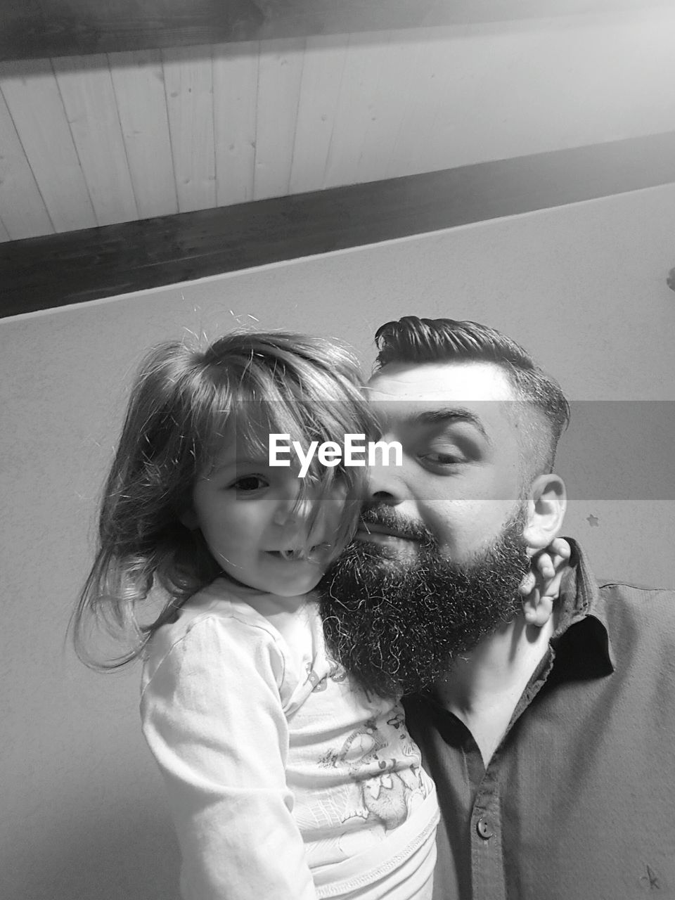 Portrait of bearded father with daughter