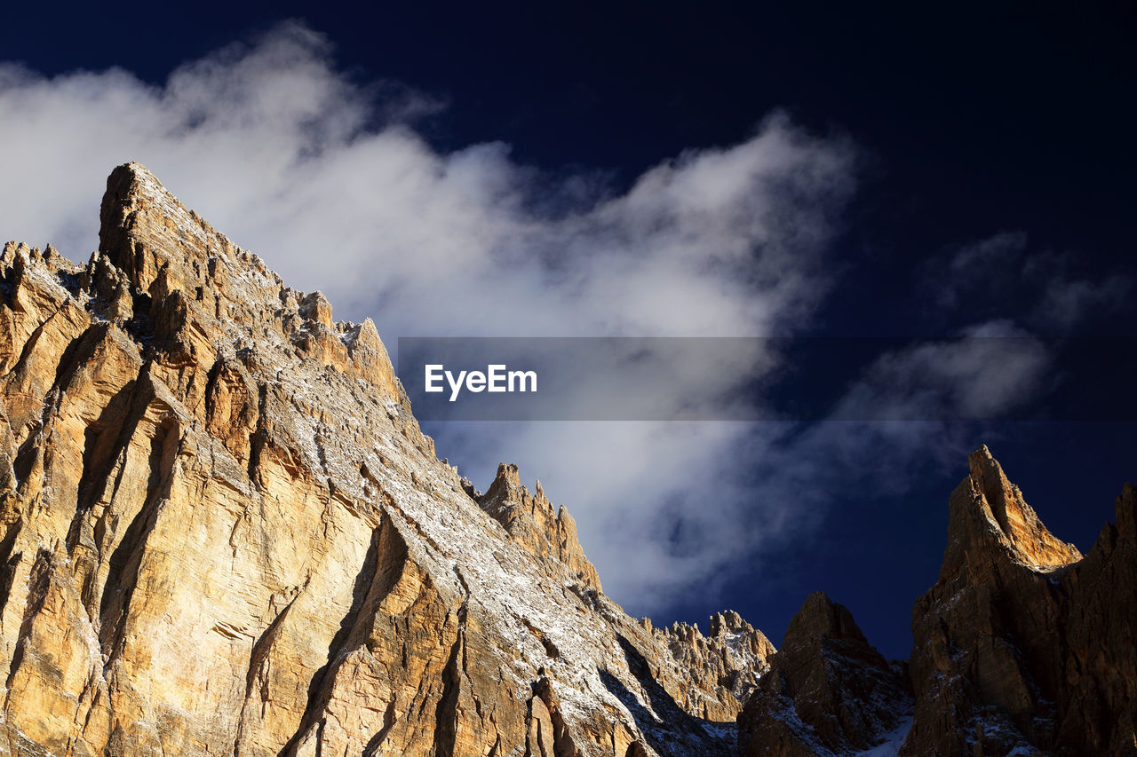 Low angle view of mountain against sky