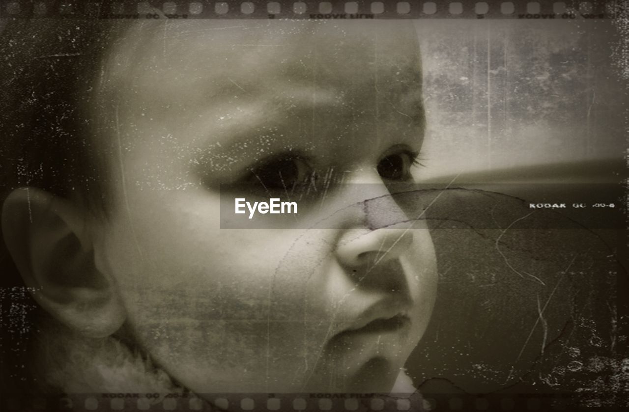 CLOSE-UP OF YOUNG WOMAN