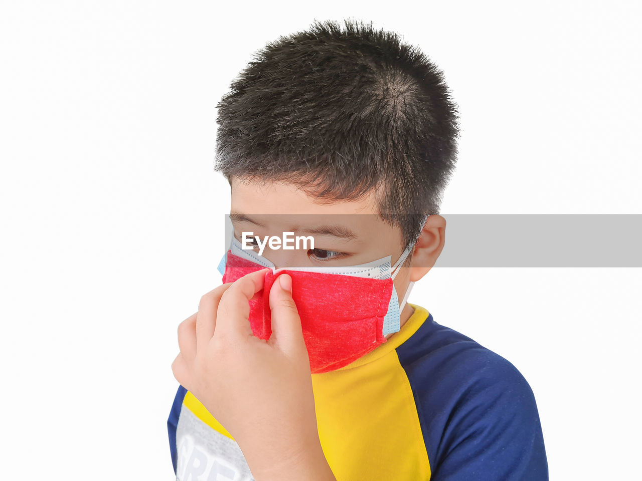 PORTRAIT OF BOY WITH WHITE BACKGROUND