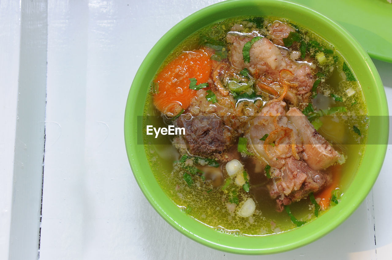 food and drink, food, healthy eating, meat, vegetable, wellbeing, bowl, freshness, dish, soup, indoors, produce, table, asian food, no people, cuisine, meal, stew, directly above, high angle view, still life, curry, beef, serving size, red meat, close-up, onion