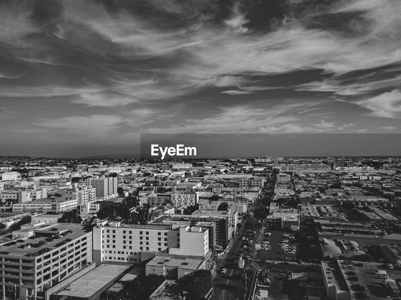 HIGH ANGLE VIEW OF BUILDINGS AGAINST SKY